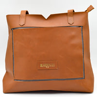 Brown leather bag with a visible brand logo on a white background