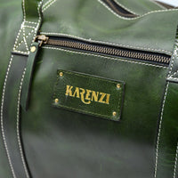 Green leather bag with 'KARENZI' brand label