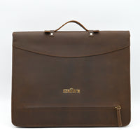 Brown leather briefcase with a visible brand logo on a white background