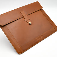 Brown leather sleeve with a brand logo on a white background