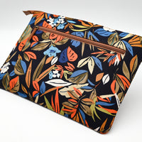 Floral-patterned pouch with a zipper on a white background