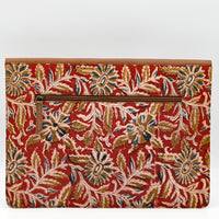 Floral patterned pouch on a white background