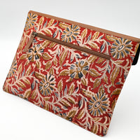 Floral patterned pouch on a white background