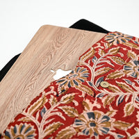 Three cutting boards with different finishes on a white background