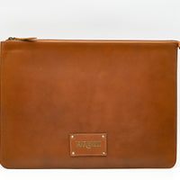 Brown leather pouch with a visible brand logo on a white background
